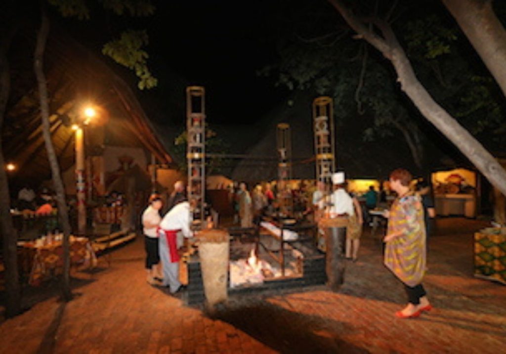 boma dinner night fire Victoria Falls Zimbabwe cultural experience guests chef