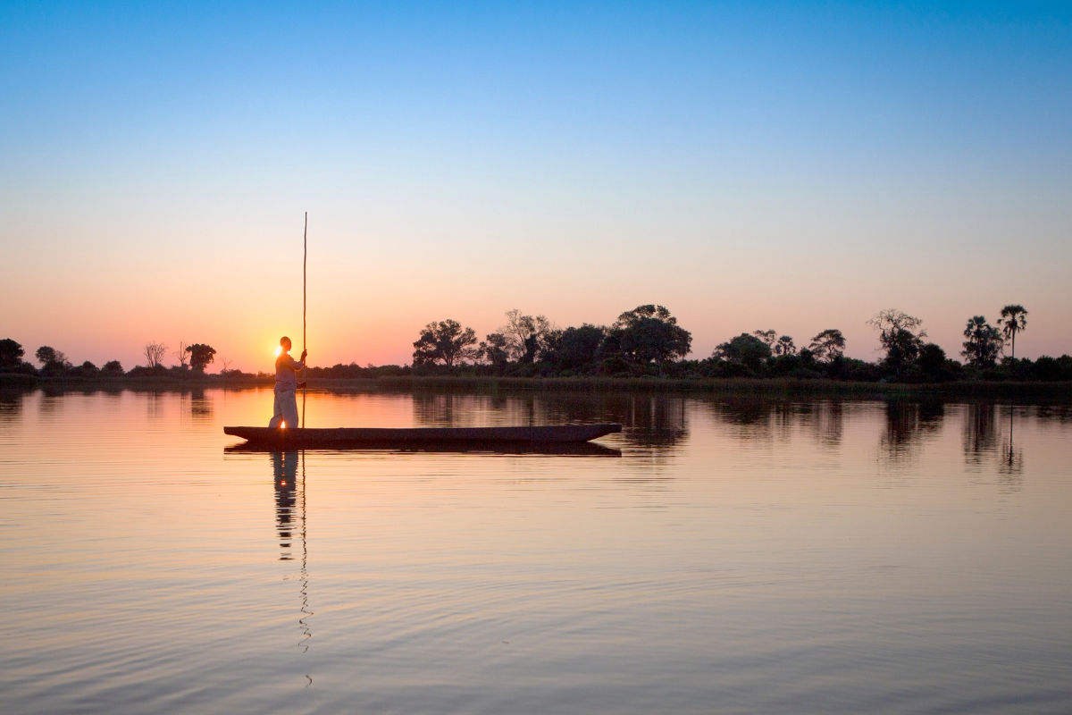 Okavango Delta — A mokoro at sunset.