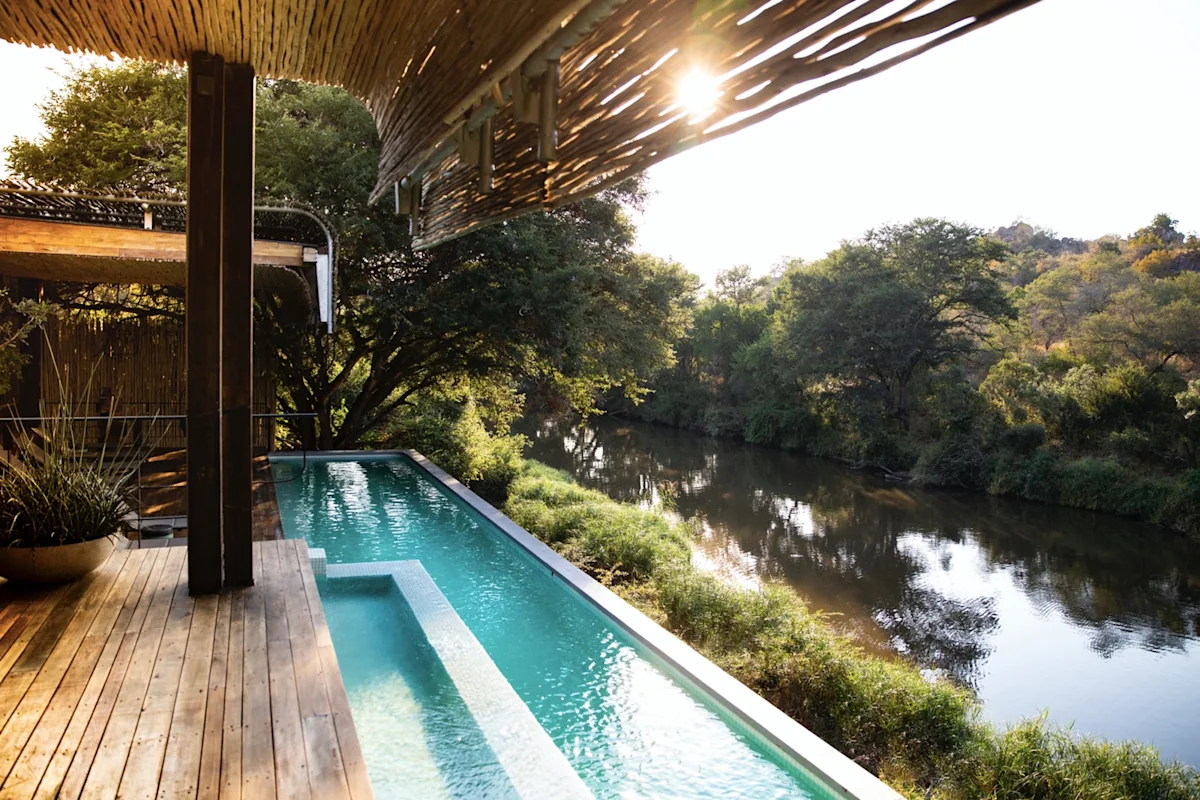 The pool at Singita Sweni Lodge looking out over the Sweni River in the Kruger National Park