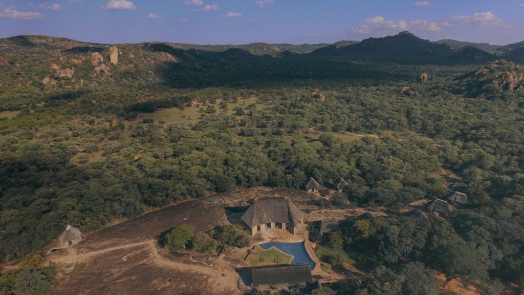 Matobo Hills Lodge, Zimbabwe: aerial view of the lodge, pool and granite landscape