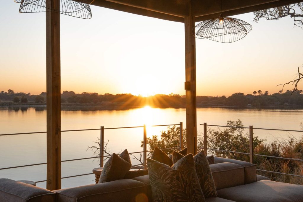 Deck at sunset on the Zambezi at Victoria Falls River Lodge