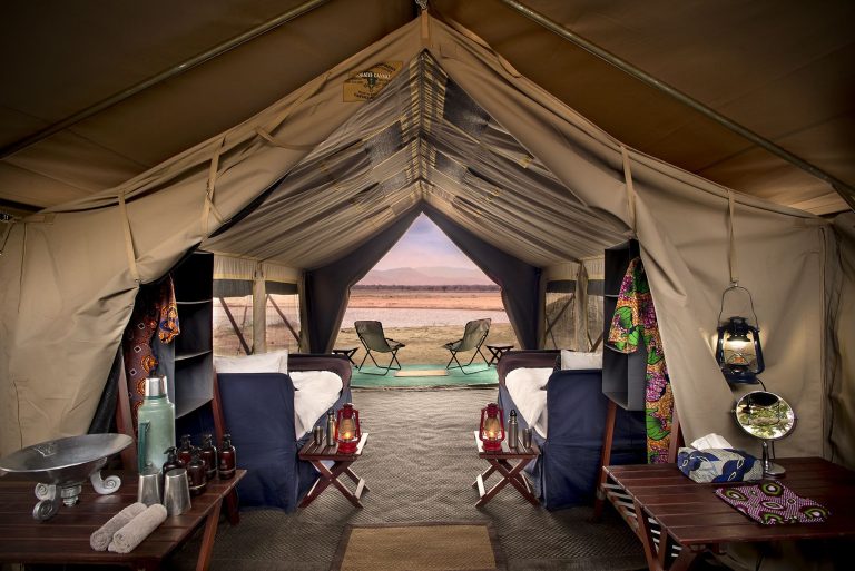 Interior of a guest tent at Zambezi Expeditions overlooking the riverbank